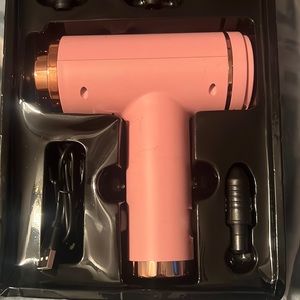 LOMI cordless muscle massager.